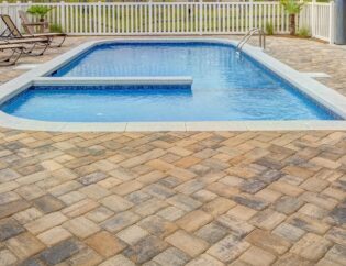 Pool surrounded by Stone Patio